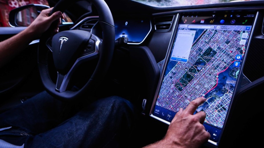 Massive Touchscreen in a Tesla Model S - This could b one of the most unsafe new car features offered