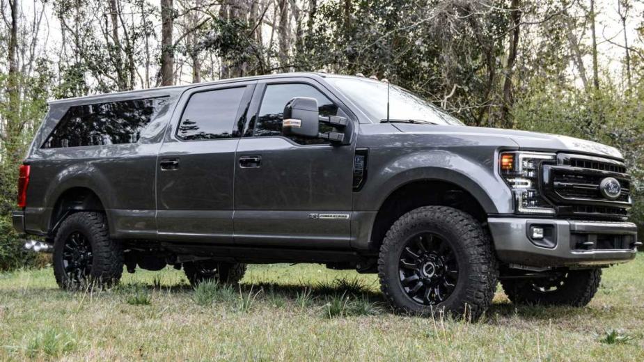 Megarexx SVN Parked in a Field - This is a massive Ford Excursion successor