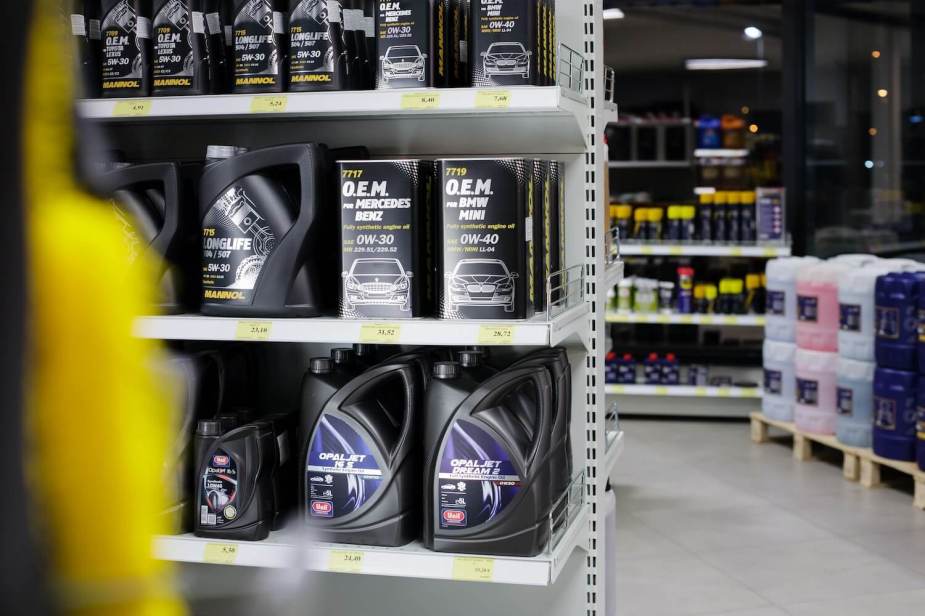 The motor oil change and filter shelf for cars and trucks in an auto parts store.