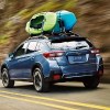 Rear angle view of blue 2023 Subaru Crosstrek crossover SUV, highlighting most common problems and if it’s reliable