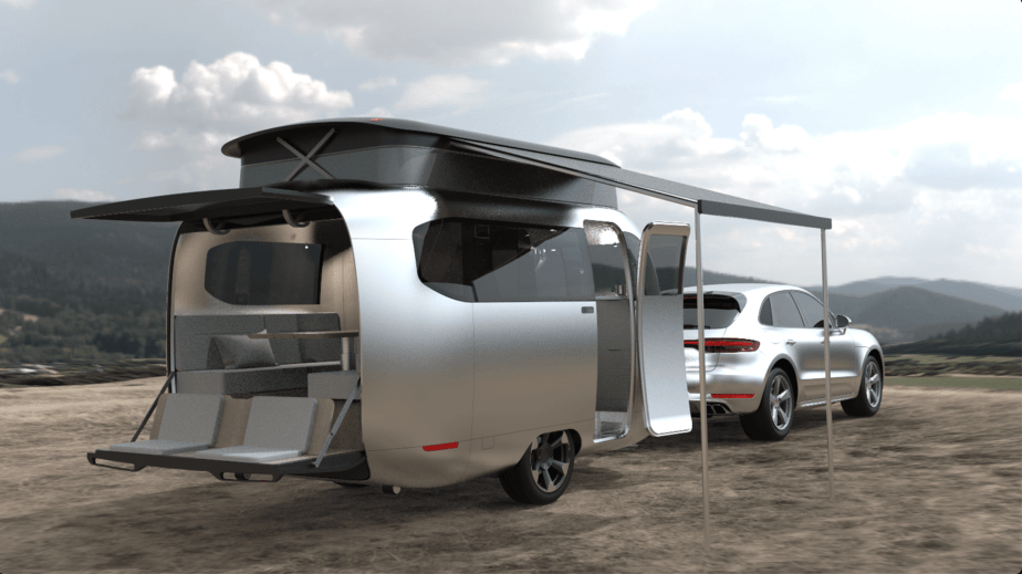 Airstream x Porsche concept trailer pulled behind a Porsche