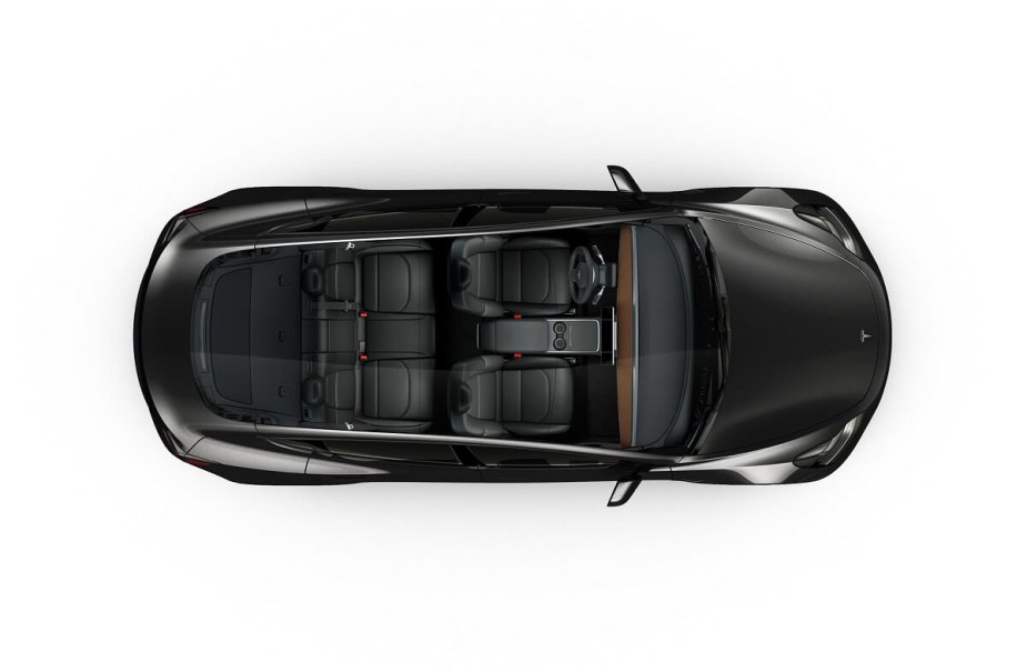 A 2023 Tesla Model 3 EV shows off its glass roof and seating for five.