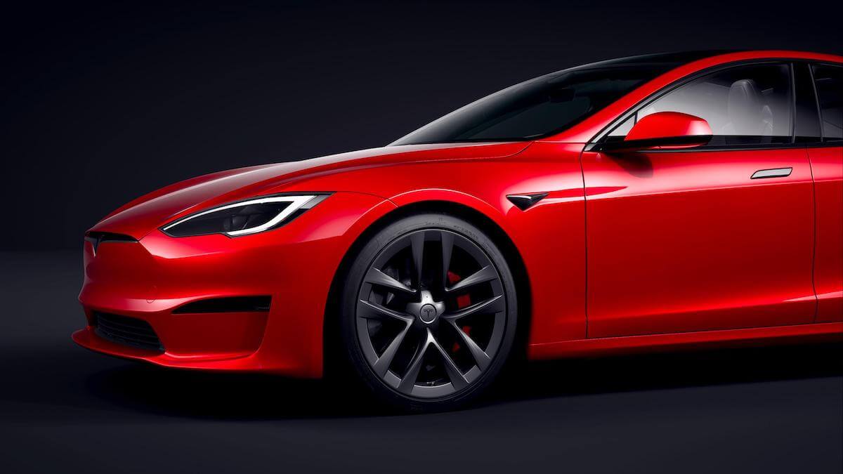 A red Tesla Model S on display.