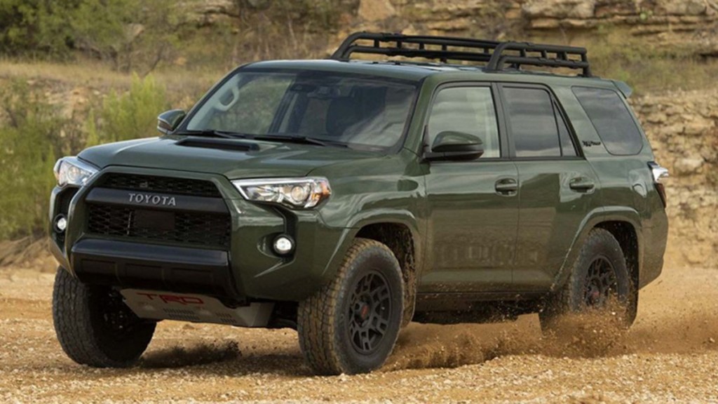 Toyota 4Runner Tearing Up a Gravel and Dirt Trail - The Toyota 4Runner ranks high for reliability among midsize SUVs
