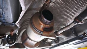 A Toyota Prius with a stolen catalytic converter at Militoâs Auto Repair