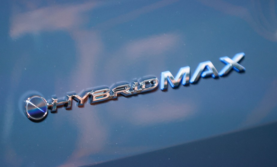 Close up image of the Hybrid Max badge on a 2024 Toyota Grand Highlander.