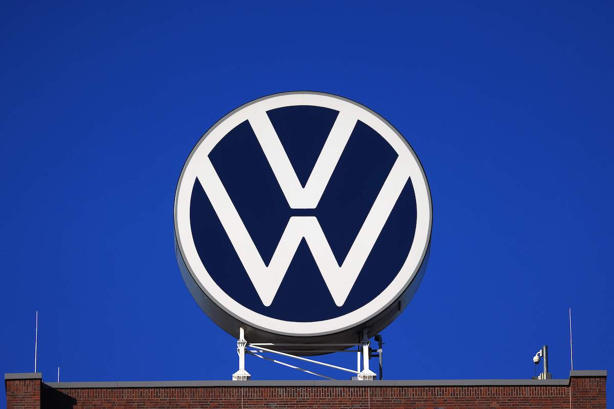 A Volkswagen logo against a blue background.