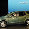 A green Saturn Vue hybrid SUV introduced at the 2006 North American International Auto Show