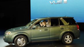 A green Saturn Vue hybrid SUV introduced at the 2006 North American International Auto Show