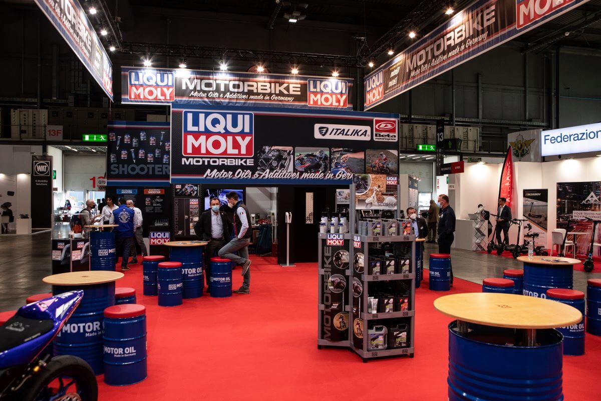 A Motorcycle motor oil and fuel additives display, including octane boosters, at EICMA in Milan, Italy