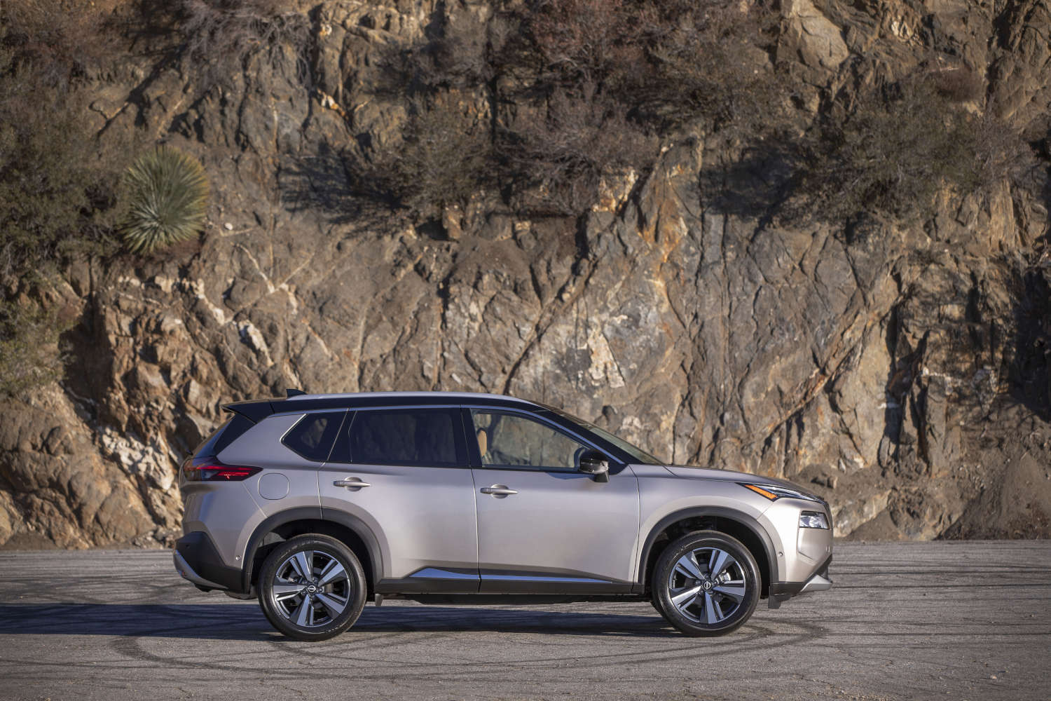 This surprising compact SUV is a Nissan Rogue in silver