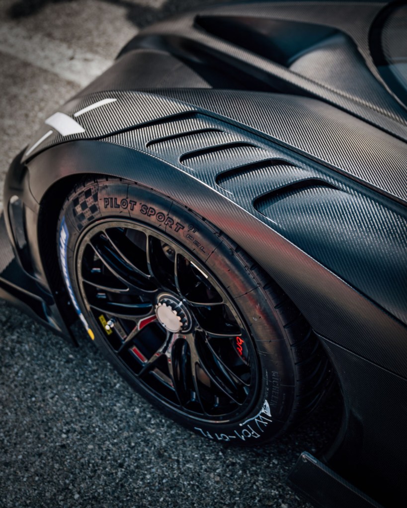 A detail image showing the slick front tire of the 2024 Bugatti Bolide
