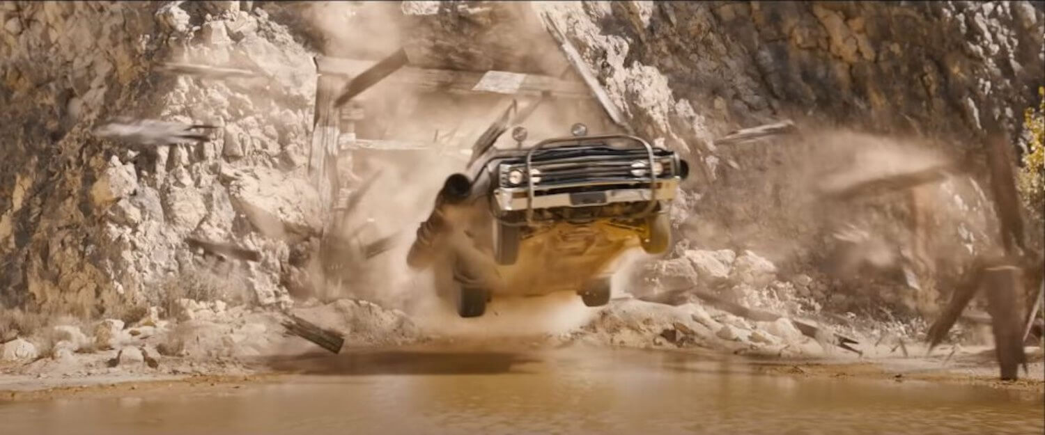 A 1967 Chevrolet El Camino drives through a mineshaft during an action sequence in Fast and Furious 10.