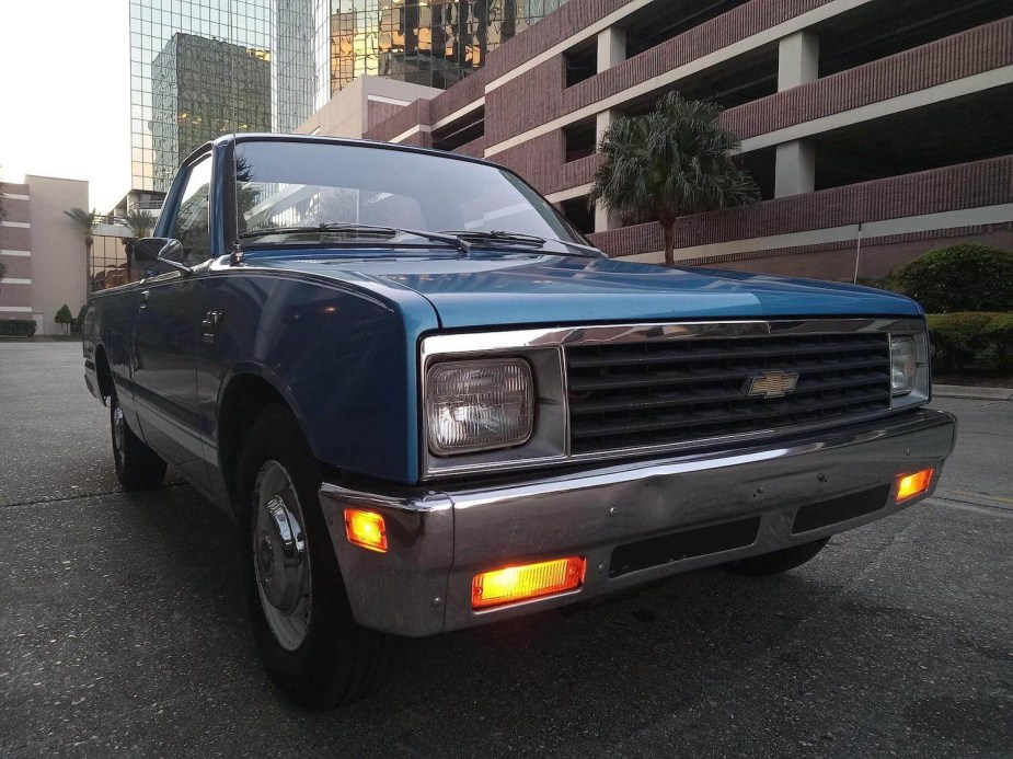 The Chevy bowtie on the grille of a compact LUV pickup truck built by Isuzu.