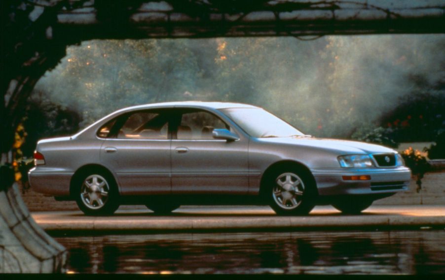 1995 Toyota Avalon in Gold near a lake