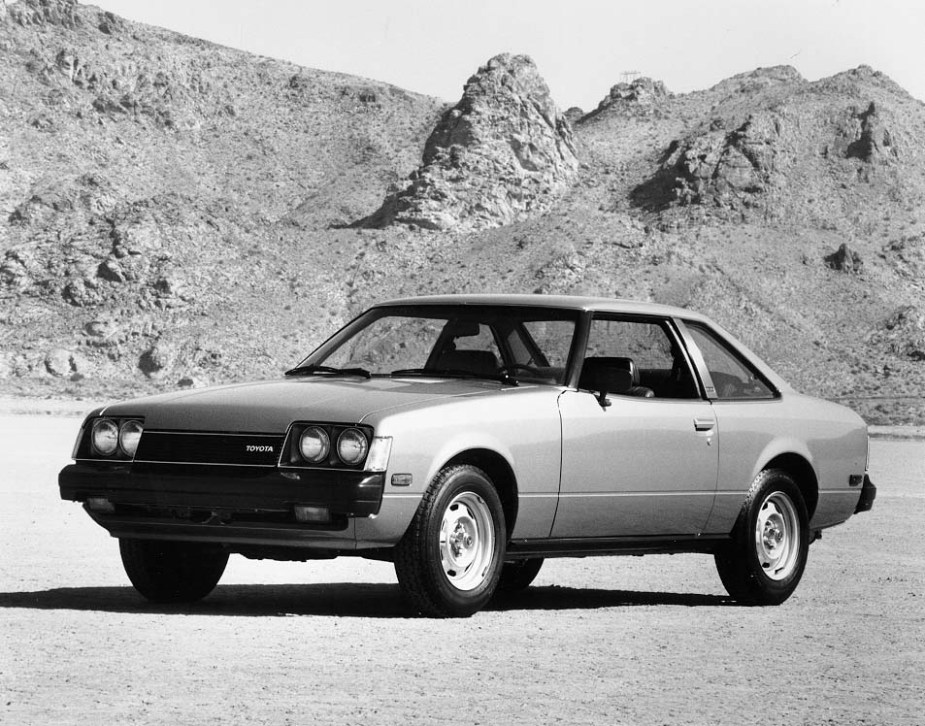a black and white photo of a 1979 Celica with the Supra package