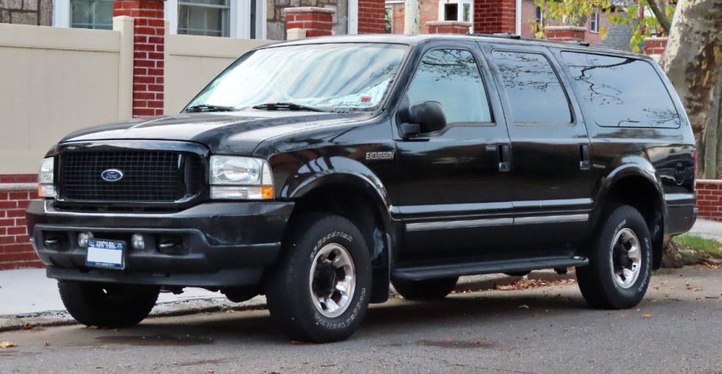 2004 Ford Excursion Limited parked on a city street