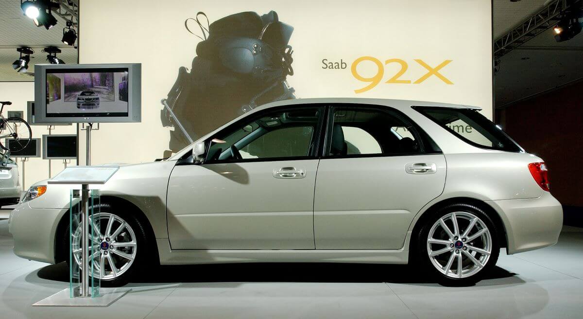 A side profile of a Saab 9-2X hatchback model on display at the 2004 New York International Auto Show