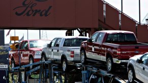 A group of 2006 Ford F-150 trucks being shipped.