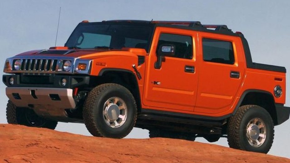 2008 Hummer H2 SUT Sitting on a Dirt Hill - The terrible Hummer H2 was impractical for its time