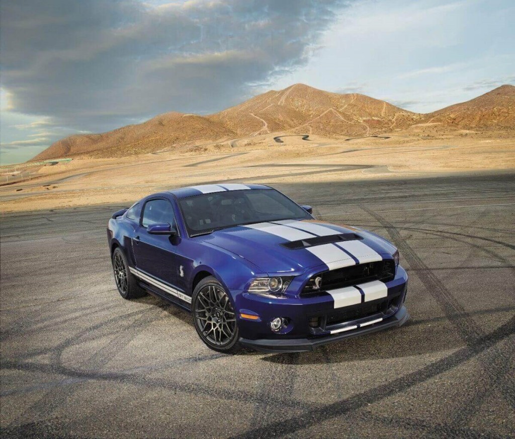 The 2014 Ford Mustang Shelby GT500, a more powerful Mustang than the Dark Horse, poses in the desert. 