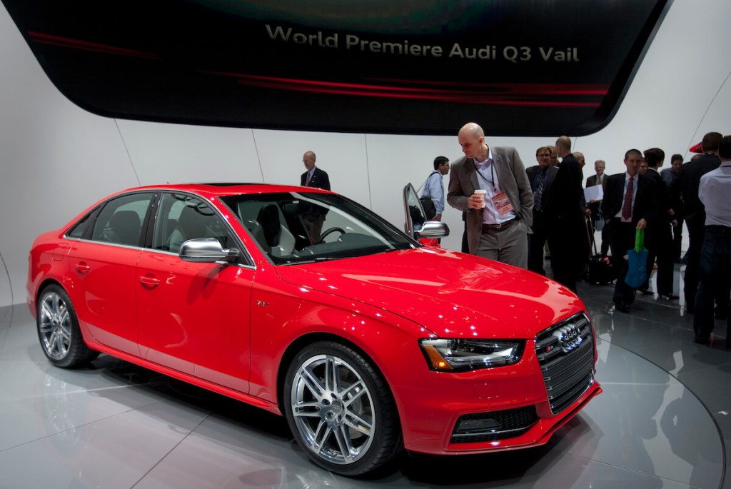 A red 2016 Audi S4 at an auto show