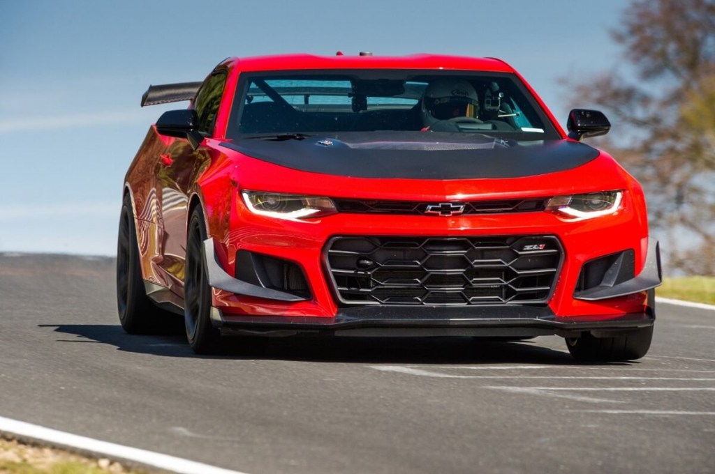 A bright red and black Chevrolet Camaro ZL1 1LE takes on the Nürburgring.