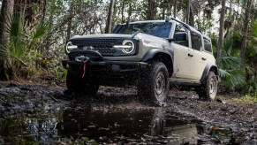 The 2022 Ford Bronco Everglades off-roading through swampy conditions