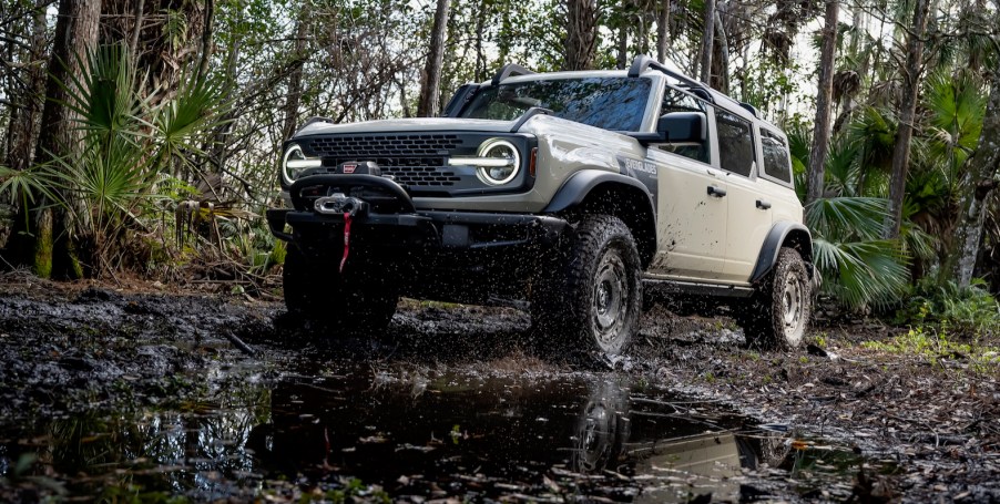 The 2022 Ford Bronco Everglades off-roading through swampy conditions