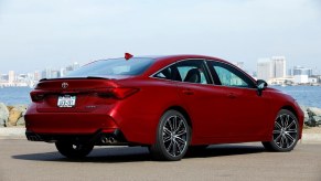A red 2022 Toyota Avalon shows off its large car styling and proportions.