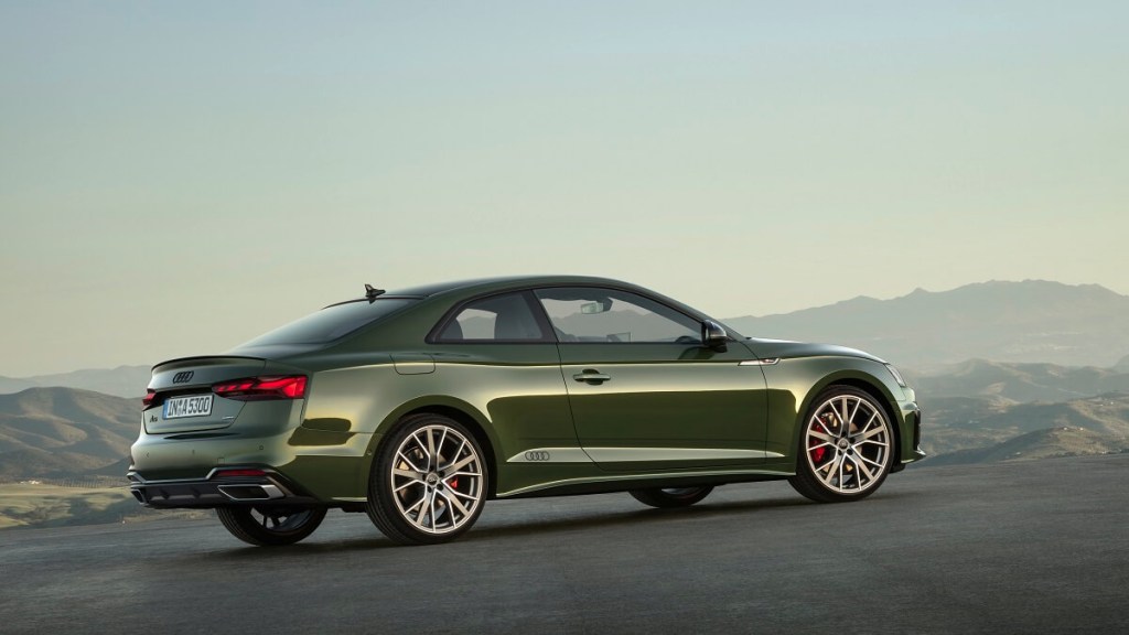 A green 2023 Audi A5 Coupe shows off its two-door body. 