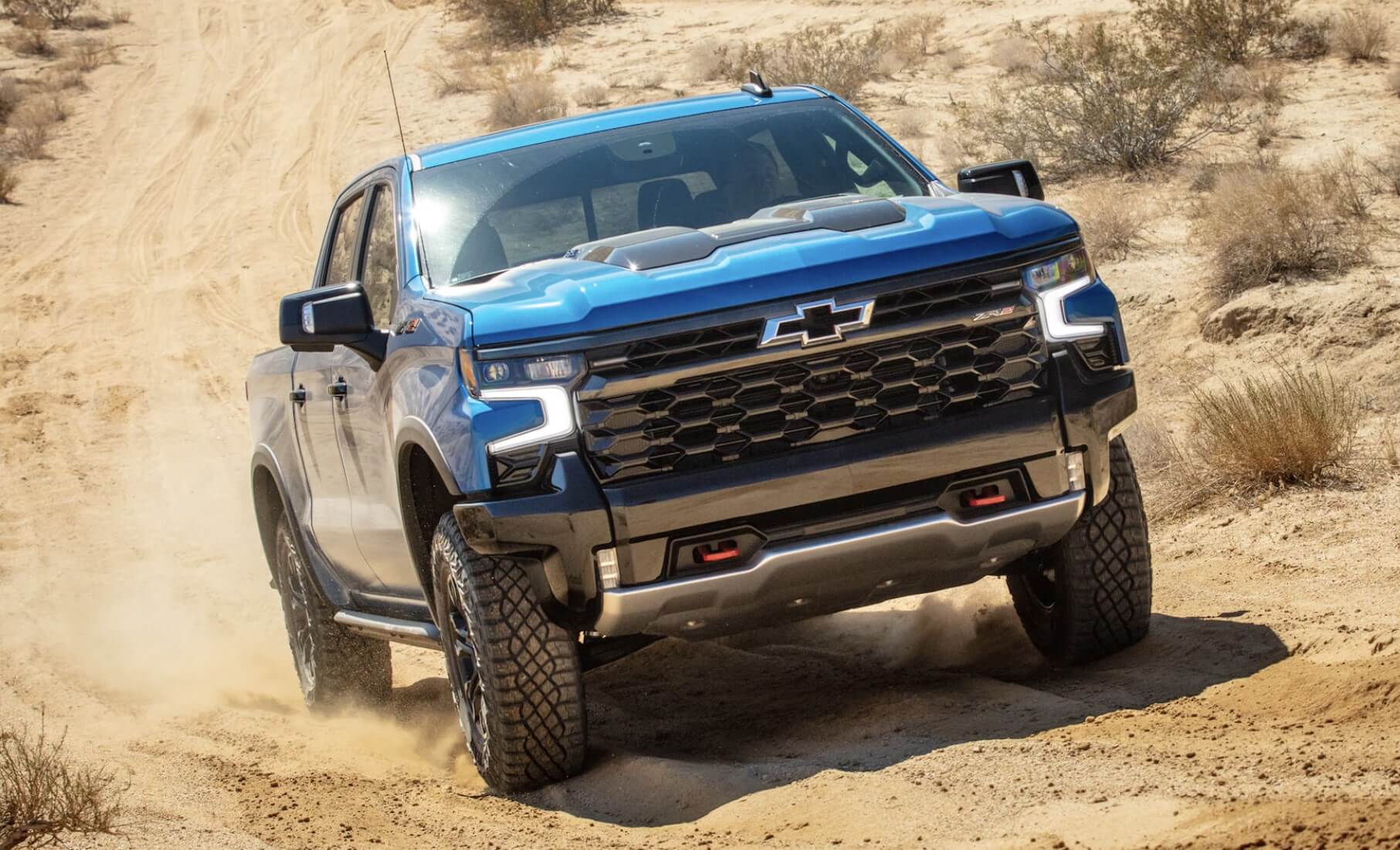 The 2023 Chevy Silverado 1500 ZR2 off-roading in sand
