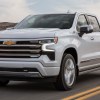 The 2023 Chevy Silverado Duramax Diesel driving on the road