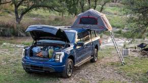 2023 Ford F-150 Lightning in camping scene