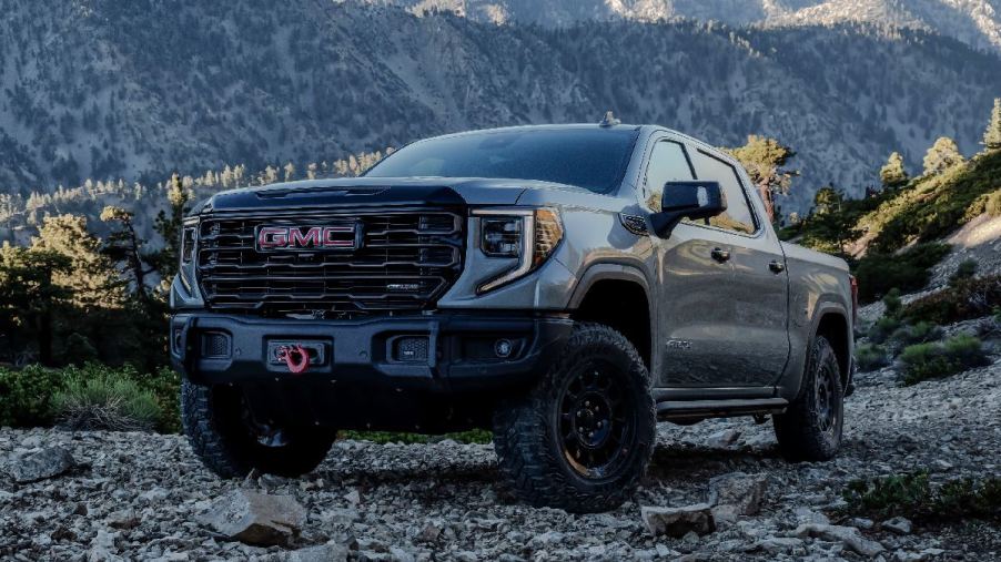 2023 GMC Sierra 1500, most reliable full-size truck, says JD Power, not Ford F-150 or Ram 1500, parked on rocks