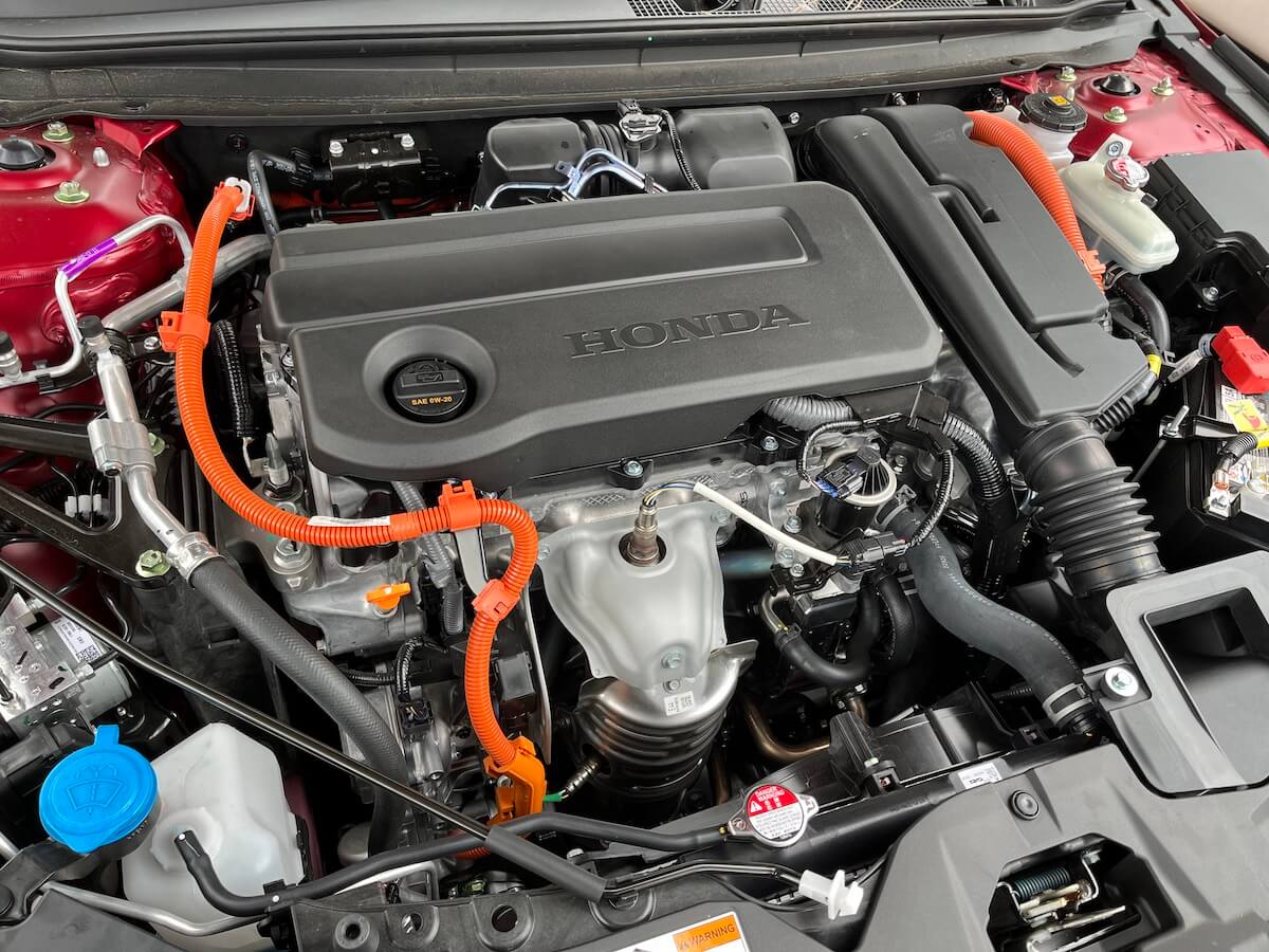 The hybrid powertrain under the hood of the fully-loaded 2023 Honda Accord Hybrid.