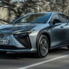 2023 Lexus RZ 450e Driving on a Country Road - The Steering Yoke is an option for this SUV