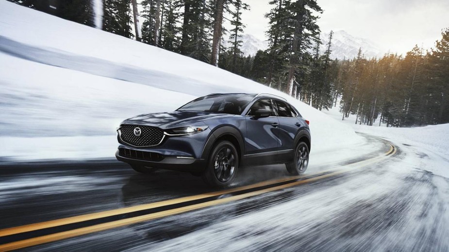 2023 Mazda CX-30 driving in the snow. Best subcompact SUV 