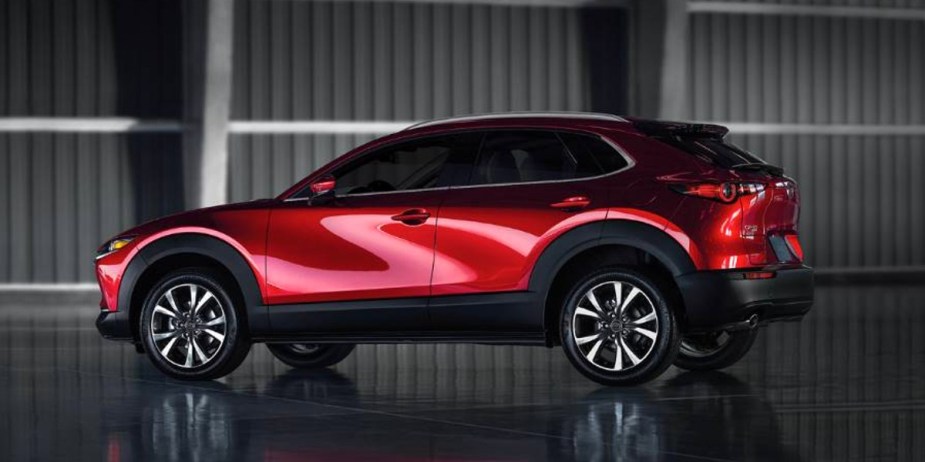 A red 2023 Mazda CX-30 subcompact SUV is parked. 