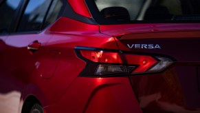 rear fender of a red Nissan Versa