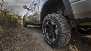 A 2023 Ram 1500, which is one of the best pickup trucks, parked outdoors going off-roading.