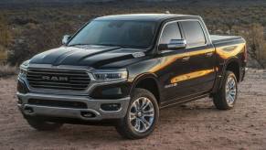 The 2023 Ram 1500 parked in the dirt