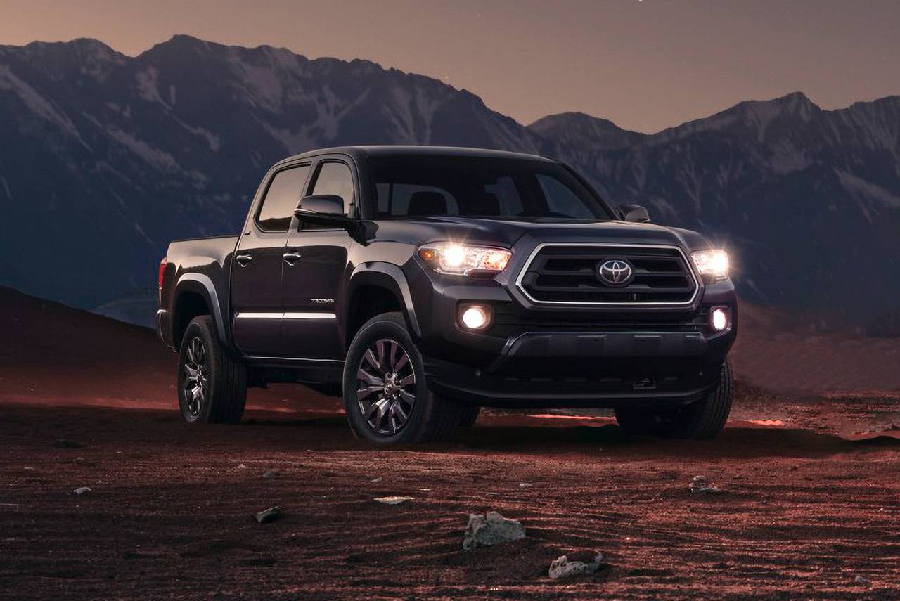 The 2023 Toyota Tacoma parked in the desert at dusk