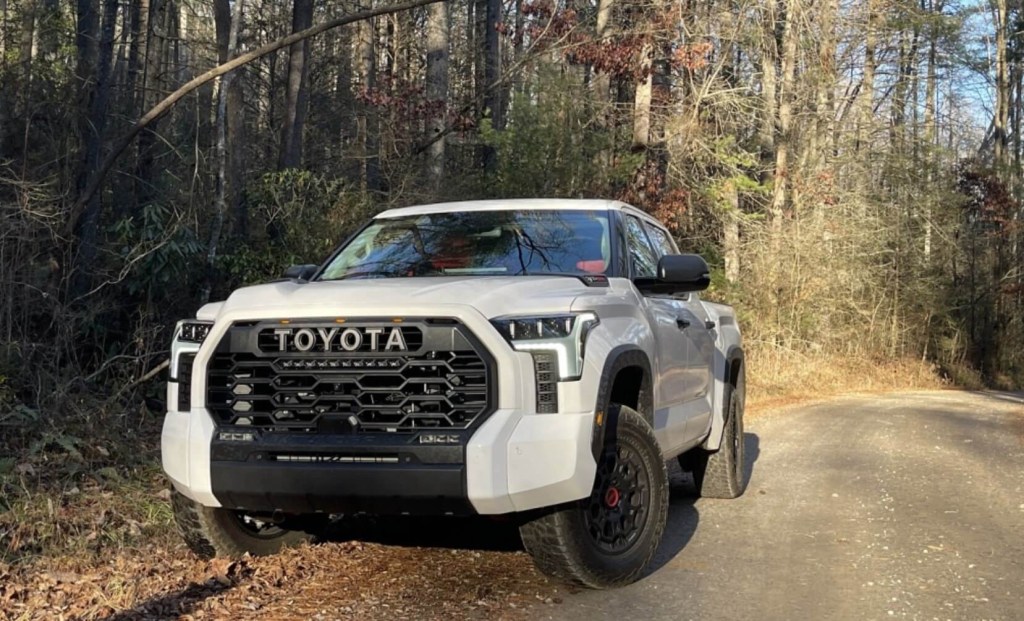 The 2023 Toyota Tundra TRd Pro off-roading on a dirt road