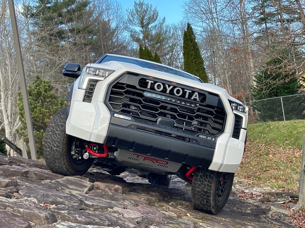 The 2023 Toyota Tundra TRD Pro climbing over rocks