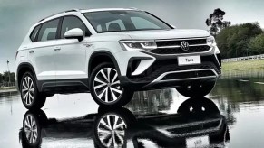 White 2023 Volkswagen Taos Posed on a Wet Tarmac - Could this be the right VW SUV for you?