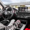A driver driving the 2023 Honda Civic Type R