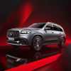 The 2024 Mercedes-Benz GLS SUV on a red background