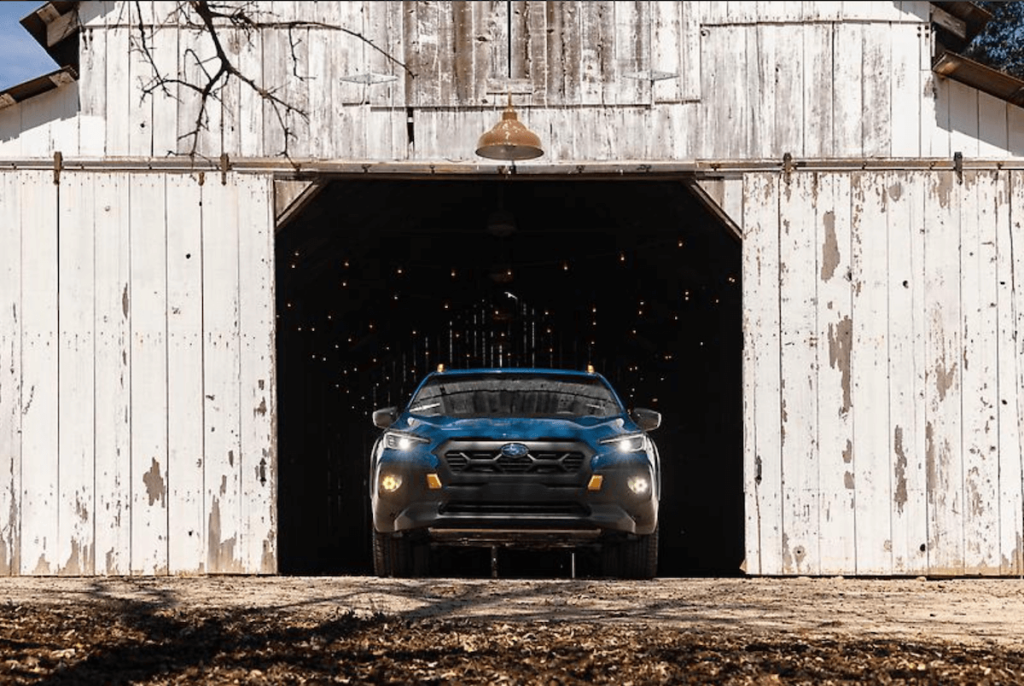 2024 Subaru Crosstrek Wilderness coming out of  a barn
