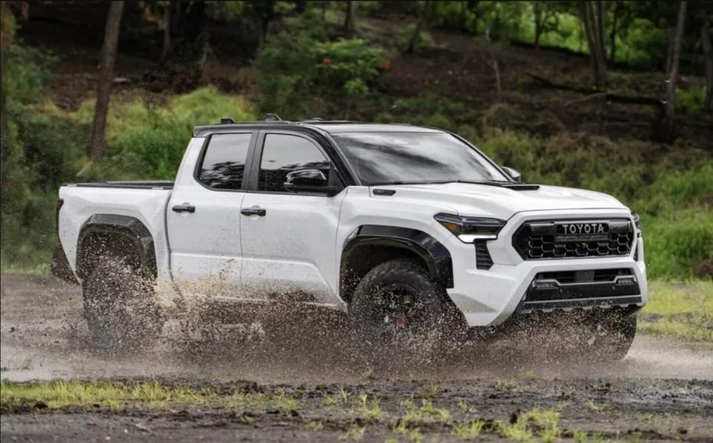 2024 Toyota Tacoma off-roading in mud 